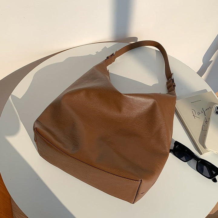 BowLift | PUFFYPOUCH – Soft PU Leather Dumpling Tote for a Playful, Chic Look
