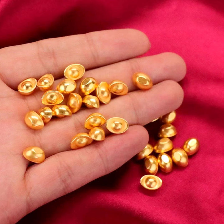 BowLift | Small gold nugget-shaped ornaments