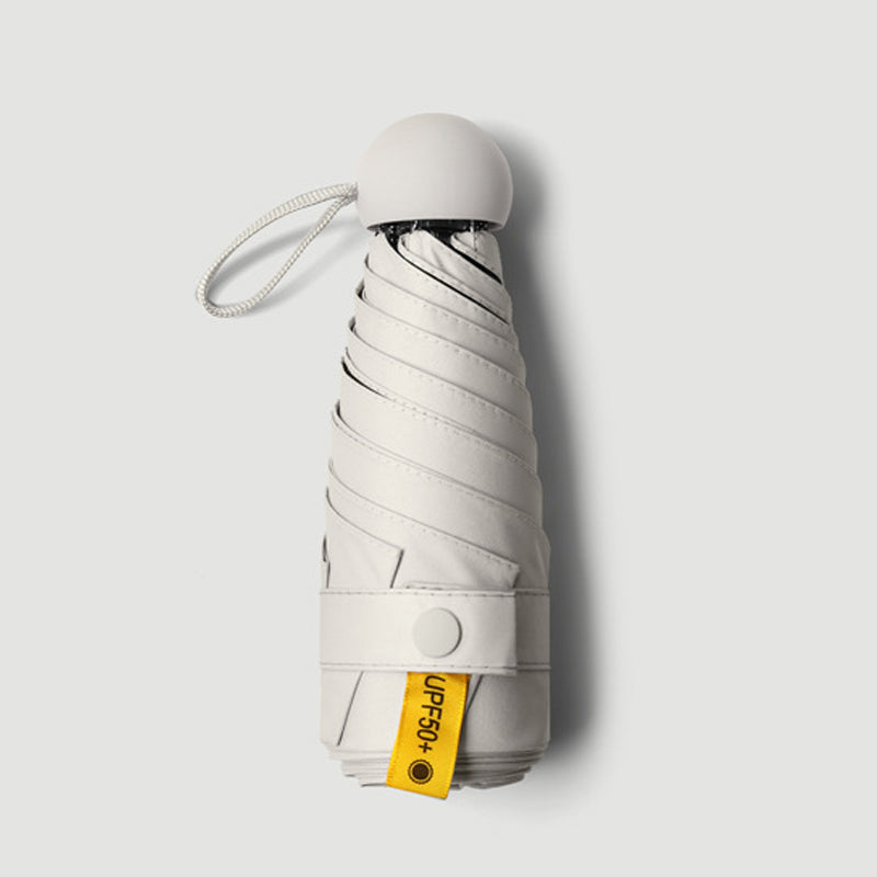 Capsule pocket umbrella with sun protection | Bowlift